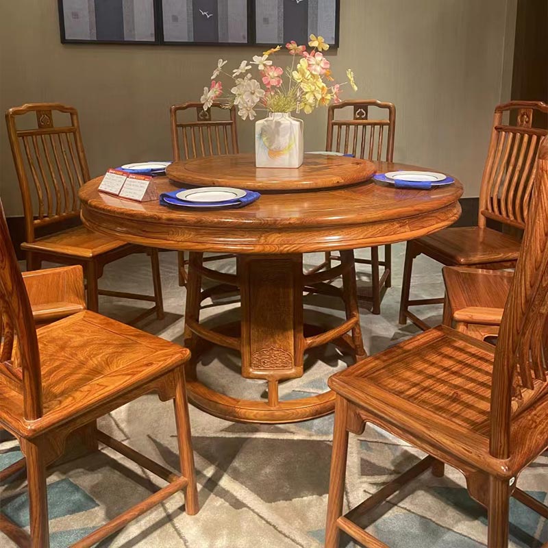 Why is a Chinese Style Round Dining Table a symbol of reunion?