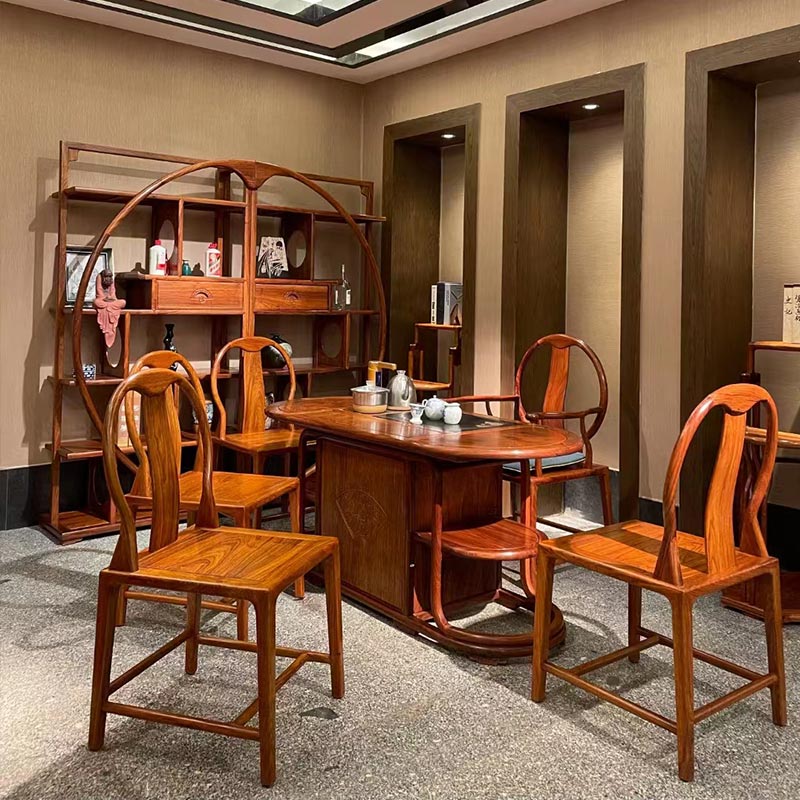 What Are The Advantages Of The Chinese Style Rosewood Tea Table Compared To A Regular Tea Table?